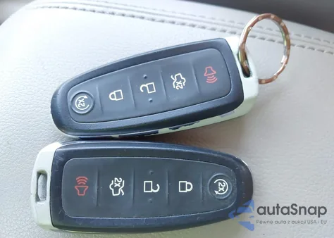 2014 Ford Escape Titanium z USA, uszkodzony, nr VIN 1FMCU9J93EUA35713